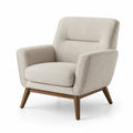 Poltrona in tessuto beige con struttura in legno